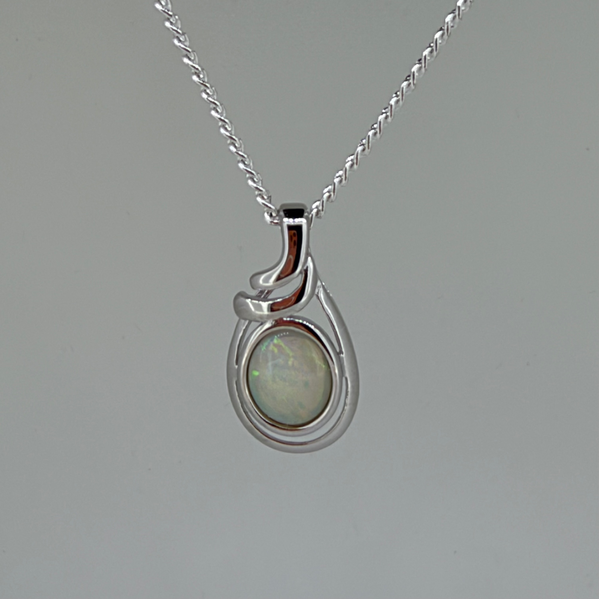 Solid Opal Oval Pendant in Sterling Silver · Style 017
