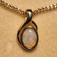 Solid Opal Oval Pendant in Gold Plated Sterling Silver · Style 208