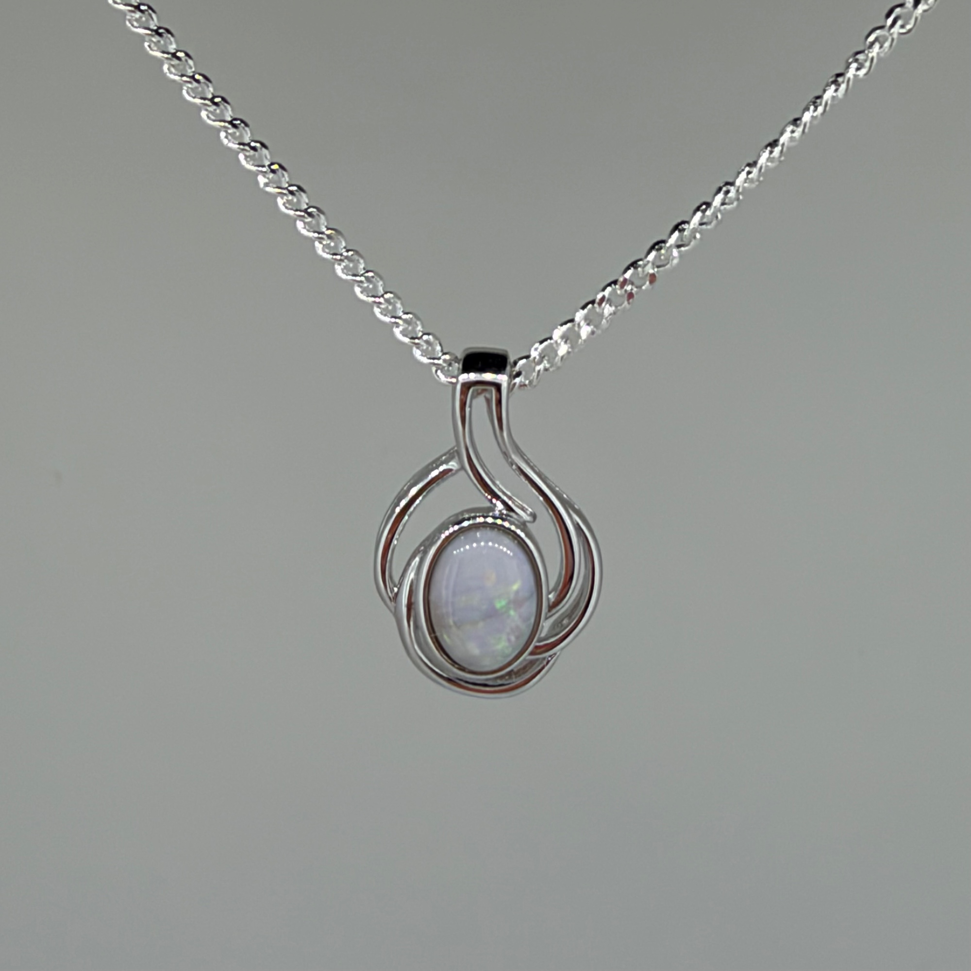 Solid Opal Oval Pendant in Sterling Silver · Style 013