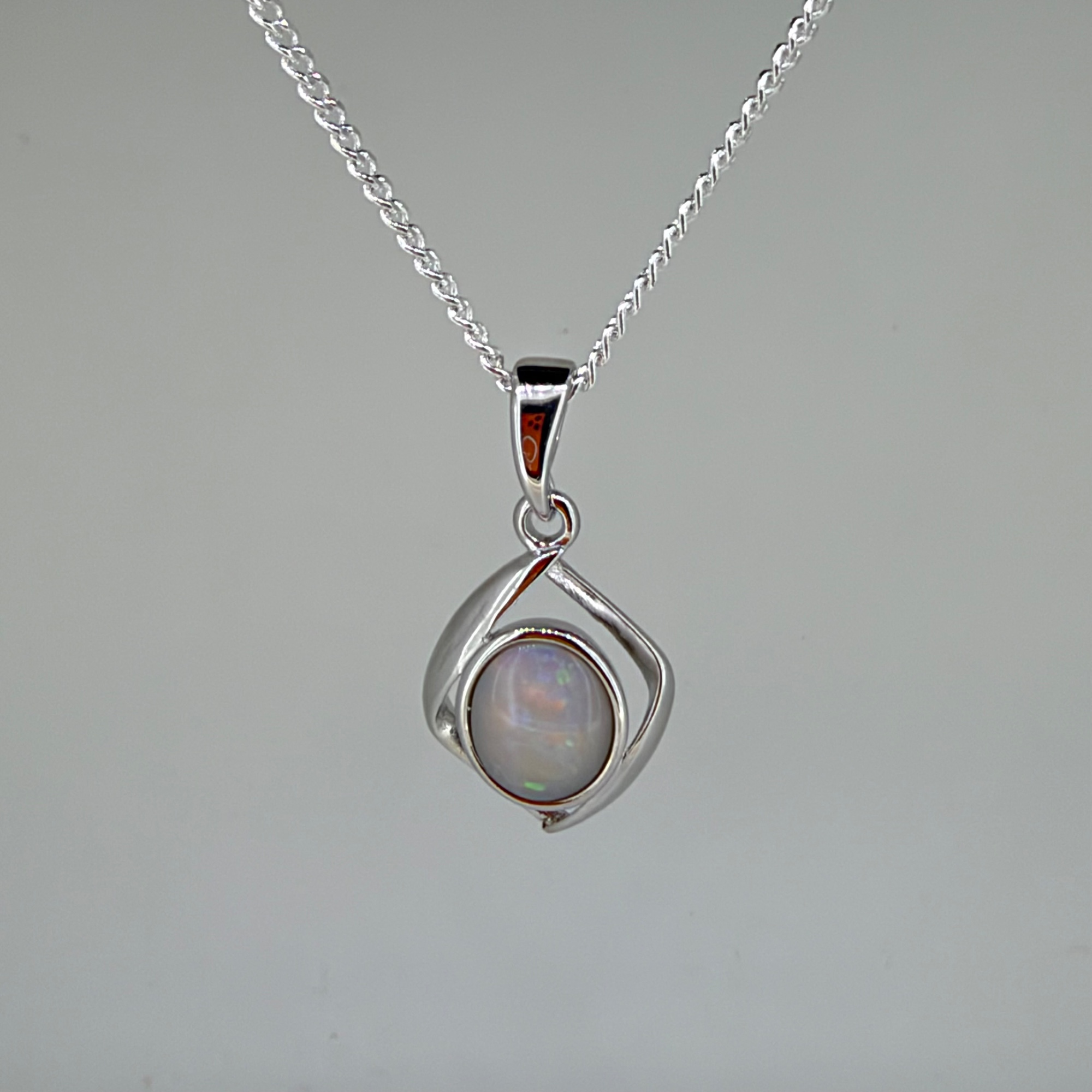 Solid Opal Oval Pendant in Sterling Silver · Style 024