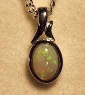Solid Opal Oval Pendant in Sterling Silver · Style 011