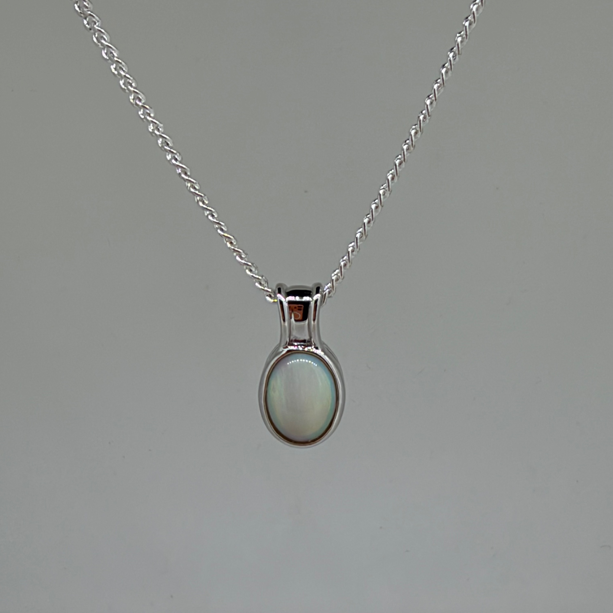 Solid Opal Oval Pendant in Sterling Silver · Style 055