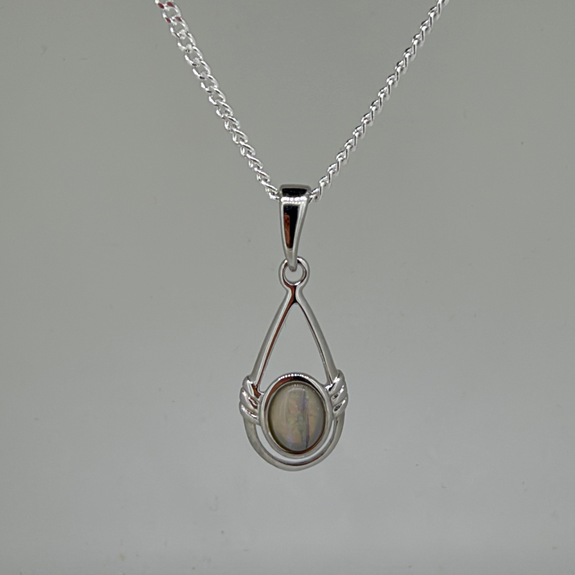 Solid Opal Oval Pendant in Sterling Silver · Style 010