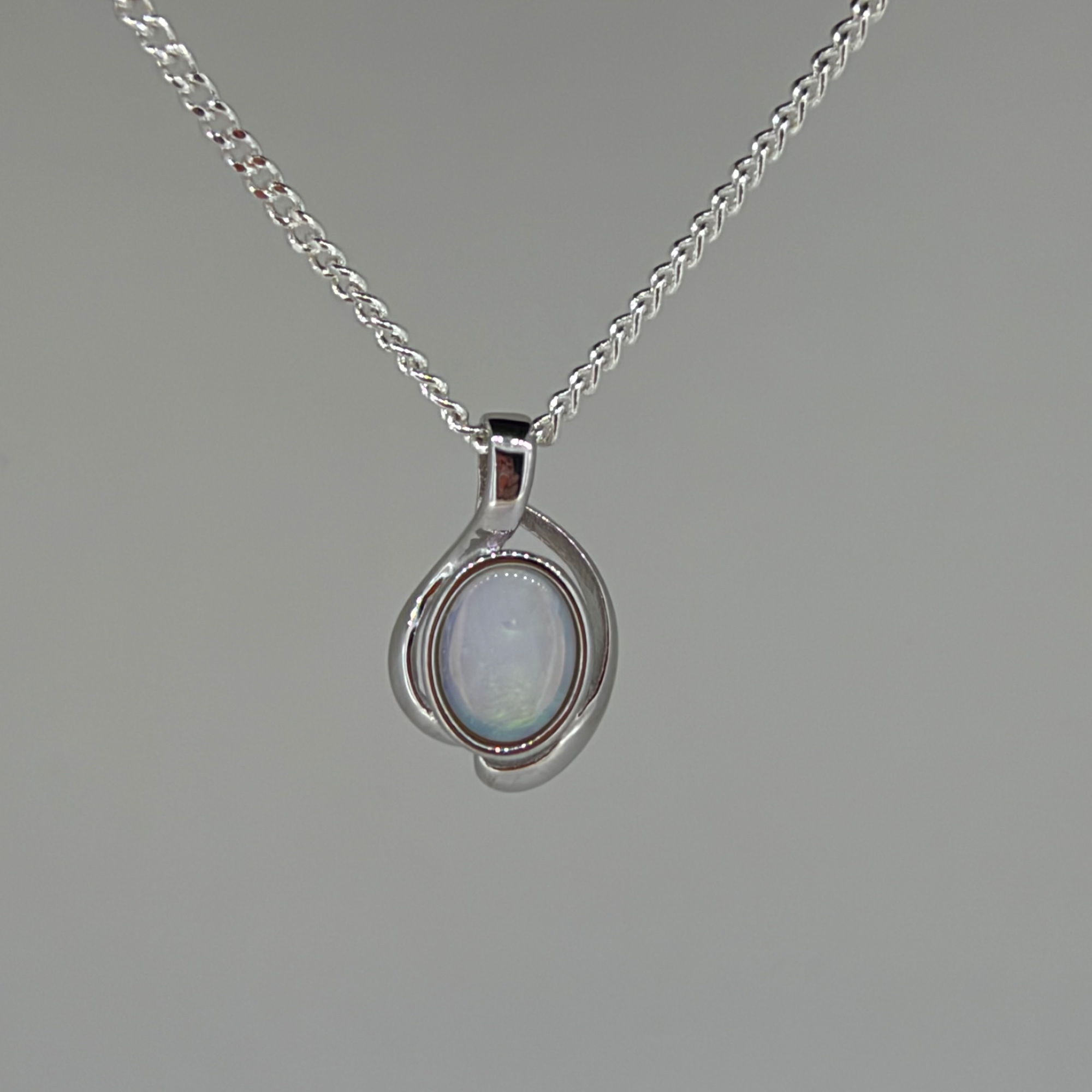 Solid Opal Oval Pendant in Sterling Silver · Style 019