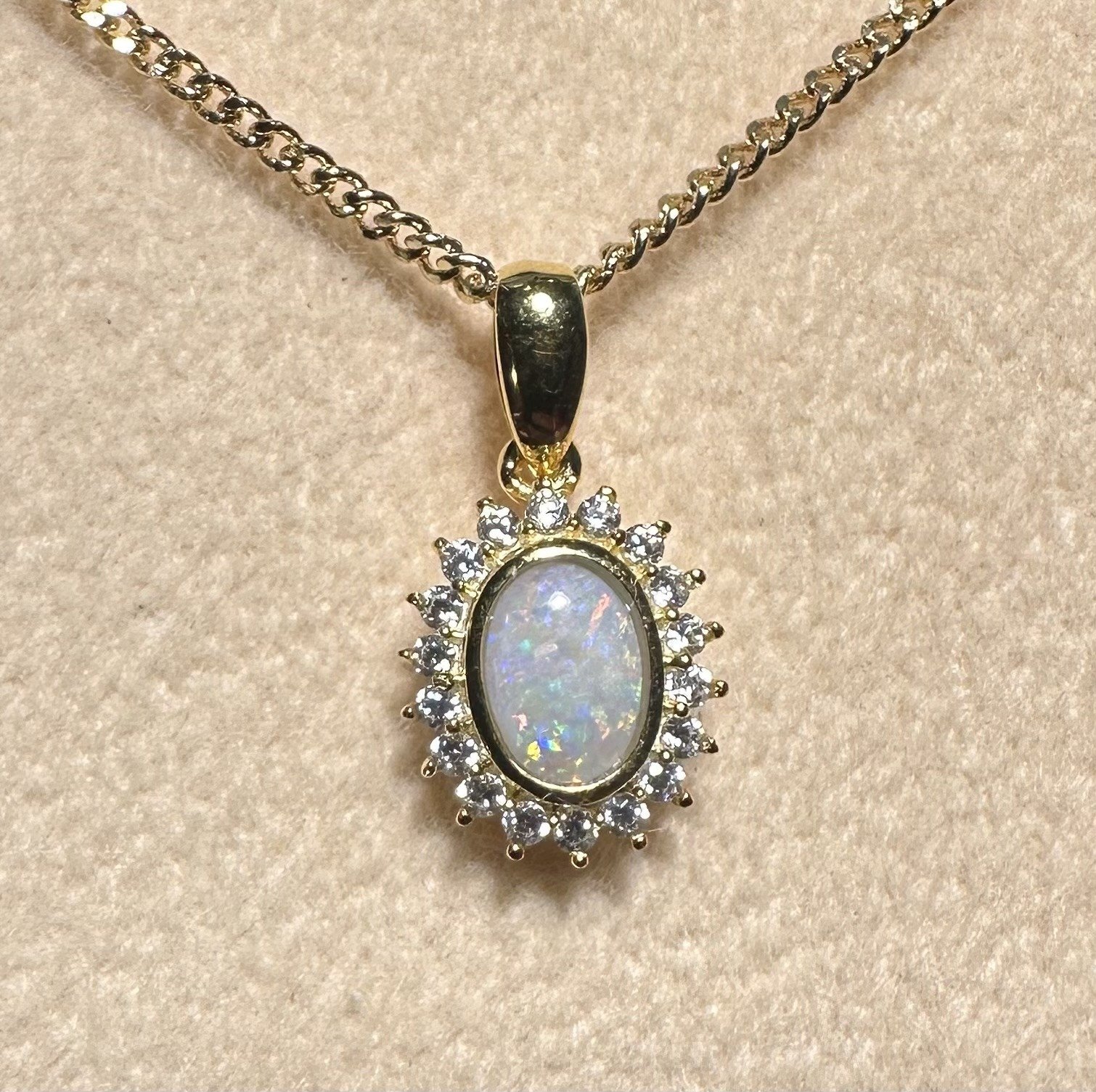 Solid Opal Oval Halo Pendant in Gold Plated Sterling Silver · Style 231