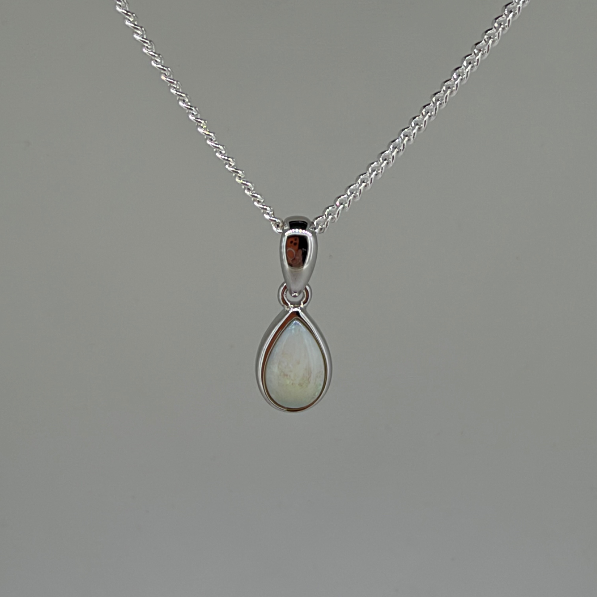 Solid Opal Pear Shape Pendant in Sterling Silver · Style 050