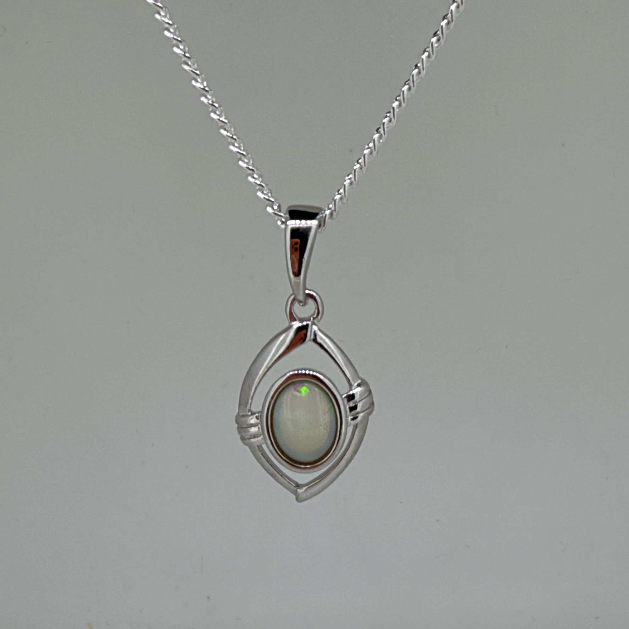 Solid Opal Oval Pendant in Sterling Silver · Style 016