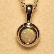 Solid Opal Round Bezel Pendant in Sterling Silver · Style 001