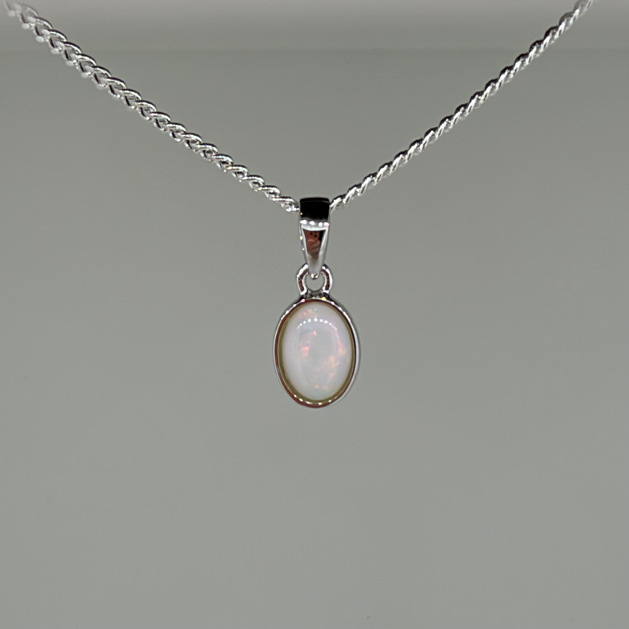 Solid Opal Oval Pendant in Sterling Silver · Style 006