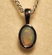 Solid Opal Oval Pendant in Sterling Silver · Style 003